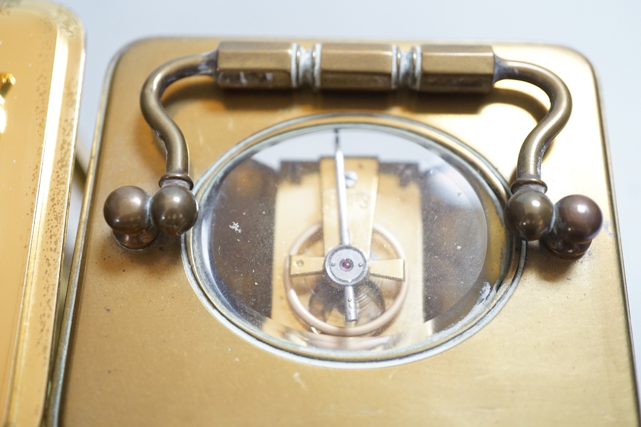 Two brass cased carriage timepieces and a brass cased carriage clock, tallest 11.5cms high